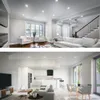 Two interior views of a modern home, showing a living room and a kitchen/dining area. Produktbild-Vorschau