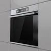 A built-in oven is shown installed in a kitchen. Produktbild-Vorschau