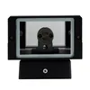 A black outdoor wall light with a clear glass front and a mounting bracket inside. Produktbild-Vorschau