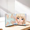 A spiral-bound coloring book for designing nail art is open on a wooden table. Anteprima dell’immagine prodotto