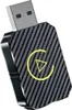A close-up studio shot of a USB car adapter with a carbon fiber texture and a yellow circular logo with a triangle inside. Produktbild-Vorschau