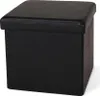 A black cube-shaped ottoman with a padded top. Náhled obrázku produktu