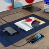 A Satechi USB-C hub is connected to a tablet and a smartphone, with two monitors in the background. Voir les images du produit