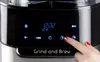 A close-up of a coffee maker's digital display and control panel, with a finger pressing a button. Podgląd zdjęcia produktu