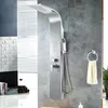 A modern shower panel system mounted on a tiled wall in a bathroom. Podgląd zdjęcia produktu