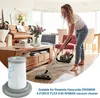 A woman is vacuuming a living room with a vacuum cleaner. A filter is in the foreground. Produktbild-Vorschau