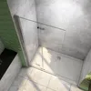 A modern bathroom shower enclosure with glass doors and a white shower tray, set against tiled walls. Produktbild-Vorschau