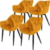 Four yellow velvet dining chairs with black legs are arranged on a white background. Náhled obrázku produktu