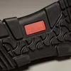 Close-up of the sole of a black Birkenstock shoe. Produktbild-Vorschau