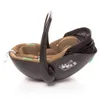 A side view of a brown and black baby car seat on a white background. Náhľad obrázku produktu