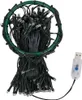 A bundle of Christmas tree lights coiled around a green ring, with a USB connector visible. Náhľad obrázku produktu