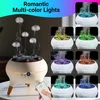 A collage of images showing a jellyfish-shaped aroma diffuser with multi-colored LED lights and a remote control. Produktbild-Vorschau