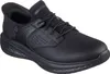 A black Skechers slip-on shoe is shown from a side angle against a white background. Produktbild-Vorschau