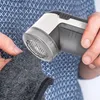 Elektrický odstraňovač pupínků s trojitou čepelí a Náhled obrázku produktu 2