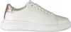 A white women's sneaker with a rose gold heel accent, shown from the side against a white background. Produktbild-Vorschau