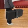 A person is carrying a black saxophone case in what appears to be a theater or auditorium. Podgląd zdjęcia produktu