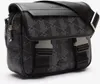 A black Lacoste messenger bag with a geometric pattern. Anteprima dell’immagine prodotto