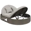 A round, rattan outdoor daybed with a canopy and cushions, shown with the top section lifted to reveal the storage compartment. Podgląd zdjęcia produktu