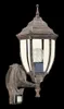 A classic outdoor wall lamp with a gold finish and white glass panels, shown against a black background. Produktbild-Vorschau