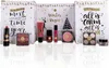 A collection of makeup and cosmetic products arranged in front of a decorative advent calendar. Produktbild-Vorschau