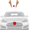 A car decorated with reindeer antlers and a red nose for Christmas. Produktbild-Vorschau