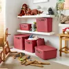 A child's room or playroom with shelves and toys. Produktbild-Vorschau