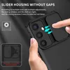 A hand is shown sliding a camera cover on a black phone case. Produktbild-Vorschau