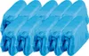 A group of blue disposable shoe covers arranged in rows. Anteprima dell’immagine prodotto
