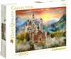 The image shows the front of a Clementoni puzzle box featuring a fantasy castle in a mountainous landscape at sunset. Podgląd zdjęcia produktu