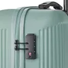 A close-up shot of a green suitcase, focusing on the combination lock and zipper. Náhľad obrázku produktu