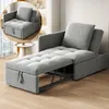 A gray sofa bed is shown in a living room setting, with an inset circular image showing a close-up of the sofa in its folded state. Náhled obrázku produktu