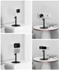 A collage of four images showing different white projectors on black stands, some on tables and some on a shelf. Anteprima dell’immagine prodotto
