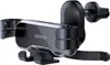 A black car phone mount with a carbon fiber-like texture and a silver trim. Produktbild-Vorschau