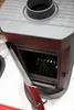 A close-up view of a freestanding wood-burning stove. Náhľad obrázku produktu