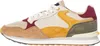 A side view of a multi-colored sneaker. Produktbild-Vorschau