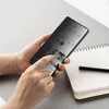 A person is holding a smartphone displaying an Instagram profile. Produktbild-Vorschau