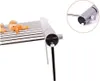 A close-up of a portable, foldable stainless steel grill rack with shrimp on it, set against a white background. Produktbild-Vorschau