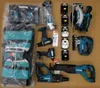 A collection of Makita power tools and accessories laid out on a brown surface. Produktbild-Vorschau