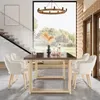 A dining room with a wooden table and chairs, set against a large window overlooking a garden. Anteprima dell’immagine prodotto