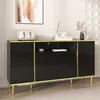 A black sideboard with gold trim and legs, decorated with a toaster, books, and a vase of flowers. Produktbild-Vorschau