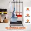 A cleaning tool organizer with mops, brooms, and a dustpan is shown in a garage or storage area. Anteprima dell’immagine prodotto