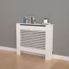 A white radiator cover is placed against a gray wall and on a light brown wooden floor. Anteprima dell’immagine prodotto
