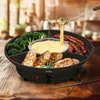 A fondue set with various food items like broccoli, sausages, and bread, set on a wooden table. Produktbild-Vorschau