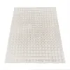 A fluffy rug with a bubble pattern on a white background. Produktbild-Vorschau