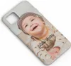 A close-up shot of a phone case with a baby's photo on it. Produktbild-Vorschau
