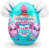 A teal egg-shaped toy with fluffy white appendages and pink accents, featuring colorful branding and illustrations of axolotl-like creatures. Anteprima dell’immagine prodotto