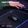 A person's hand is shown resting on a keyboard, with a gaming mouse on a mousepad in the foreground. Text overlays describe the product's features. Produktbild-Vorschau