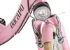 Close-up of the front of a pink bicycle, showing the headlight and brakes. Produktbild-Vorschau