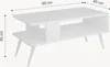 A white rectangular coffee table with two shelves and angled legs, shown from a slightly elevated side angle. Dimensions are indicated by lines and text. Podgląd zdjęcia produktu