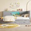 A child's bedroom with a gray bed, colorful rug, and decorative shelves. Podgląd zdjęcia produktu